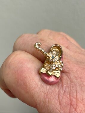 Vintage whimsical Carolee rhinestone cat in a pink enamel slipper brooch
